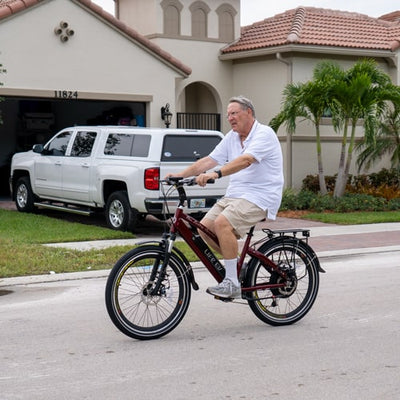 Jay's Google review of the Genesis R 400; picture of her with the Custom Genesis R 400 ebike.bike.